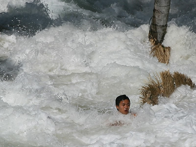 From news.com.au: 'Doomed ... The man struggles to keep his head above water as he is buffetted by the currents. His body was found a kilometre away / Hellmut Issels'